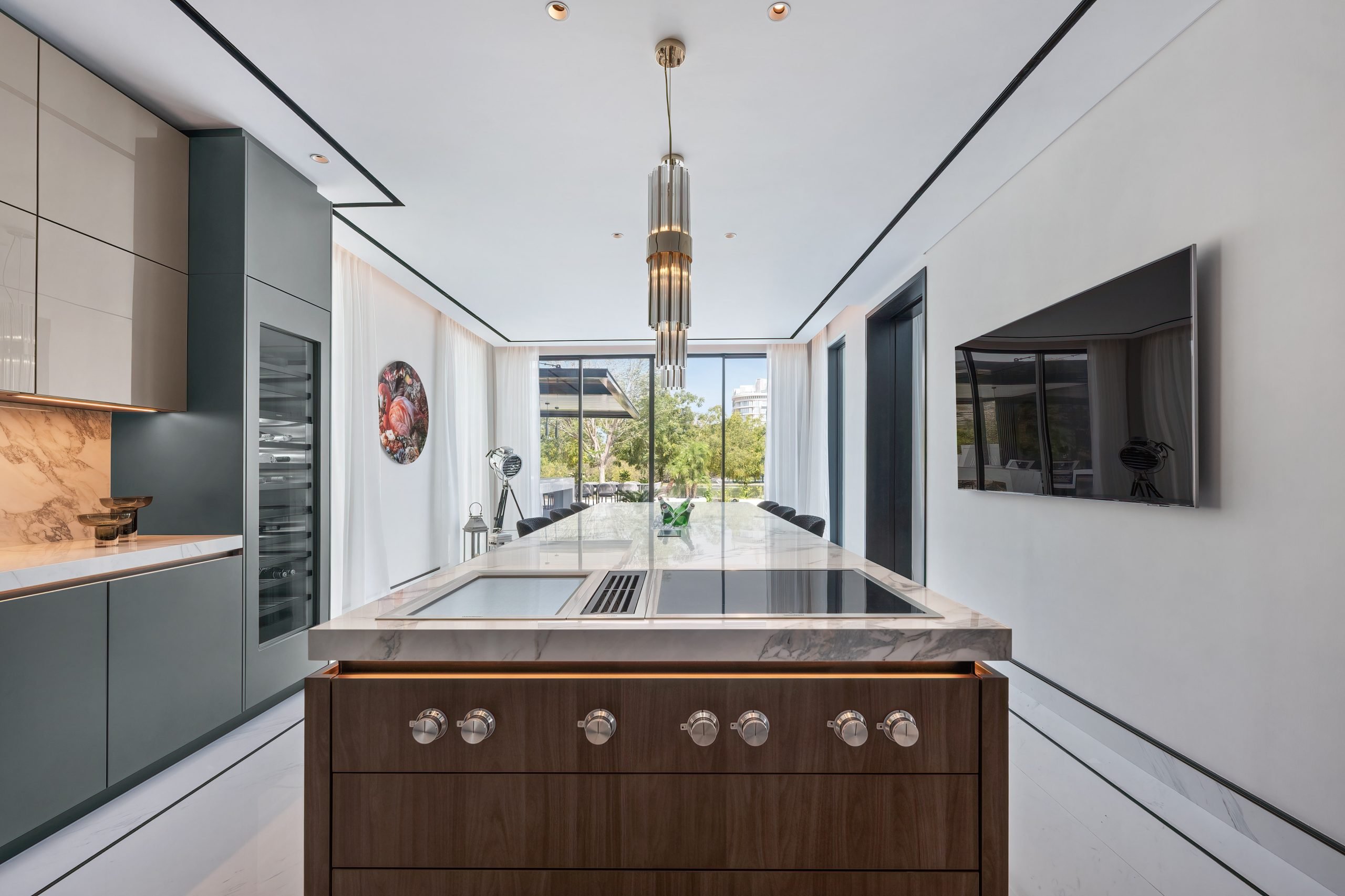 Narrow view, possibly a contemporary or open-concept kitchen with light colors.