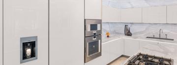 Bright, modern kitchen at the Mirzikinian residence.